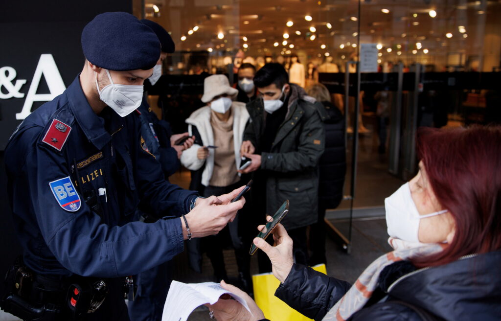 file photo: police patrol streets to check people's vaccination status in vienna