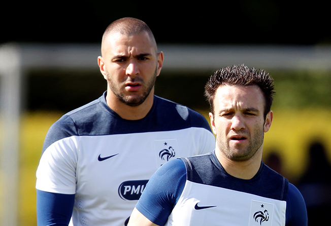 file photo: france's valbuena and benzema attend a training session in clairefontaine