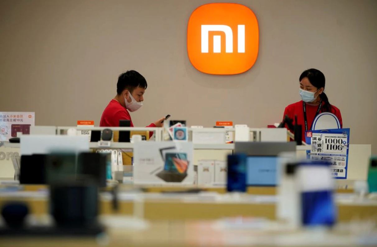 image Smartphone maker Xiaomi switches China playbook with eye toward EV showrooms