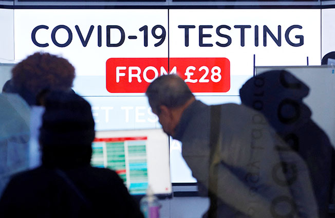 image Britain reports record 106,122 new Covid-19 cases