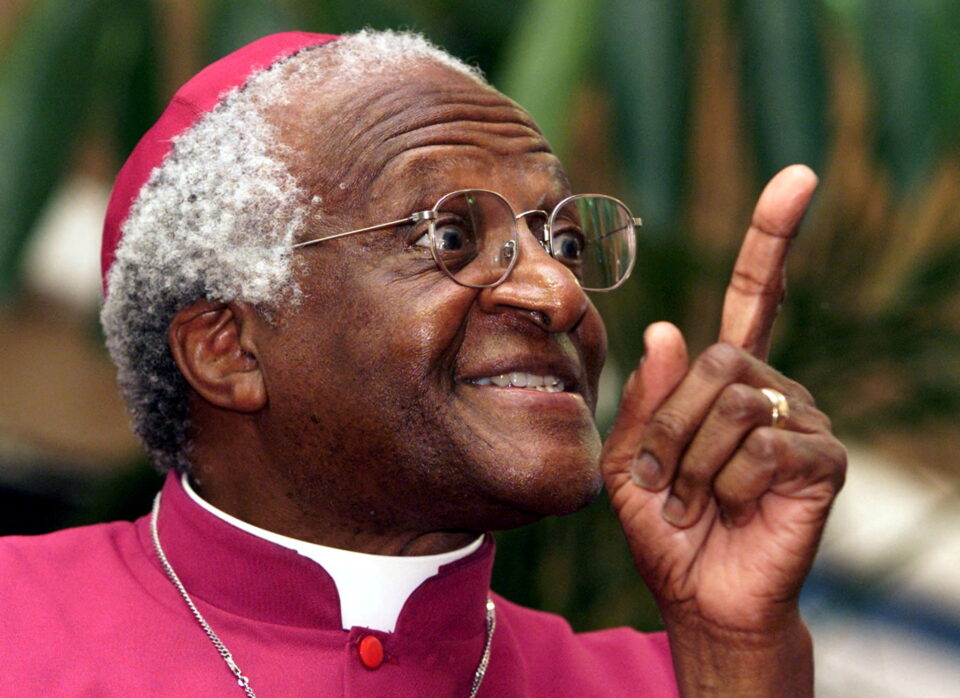 file photo: archbishop desmond tutu makes a point as he addresses a meeting march 16, 2001 to raise awareness fo..