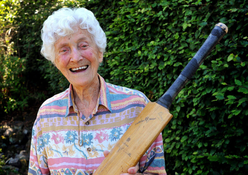 english women's cricketer eileen ash, now 108, with the bat signed for her by sir don bradman on new year's day 1949. photo: bill smith