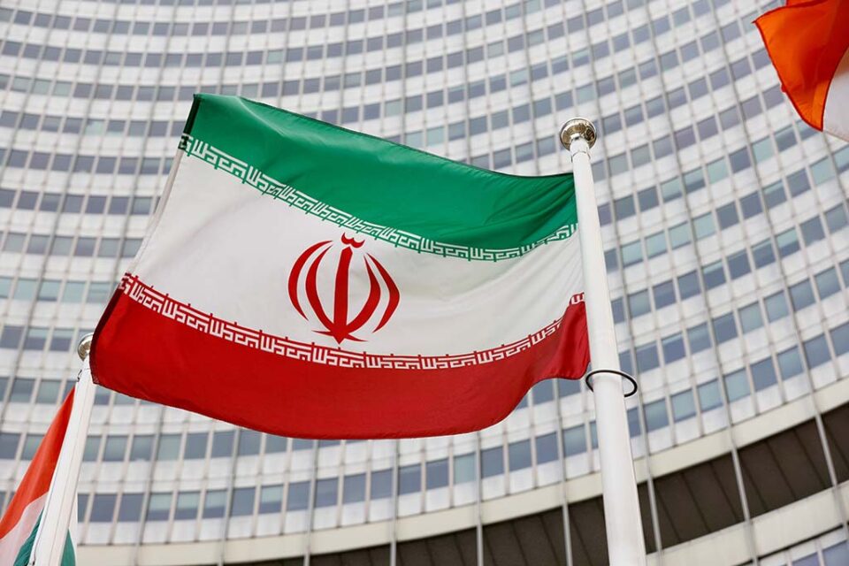 file photo: the iranian flag waves in front of the international atomic energy agency (iaea) headquarters in vienna