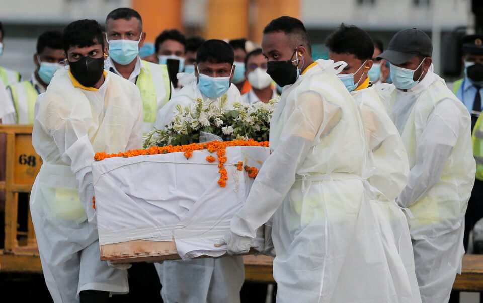 the coffin with remains of sri lankan national priyantha kumara, who was beaten to death and burnt by mob in pakistan, arrives in sri lanka