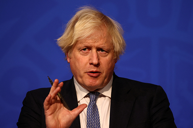 cover British PM Johnson is &#8216;taking charge&#8217; after lockdown party row, minister says