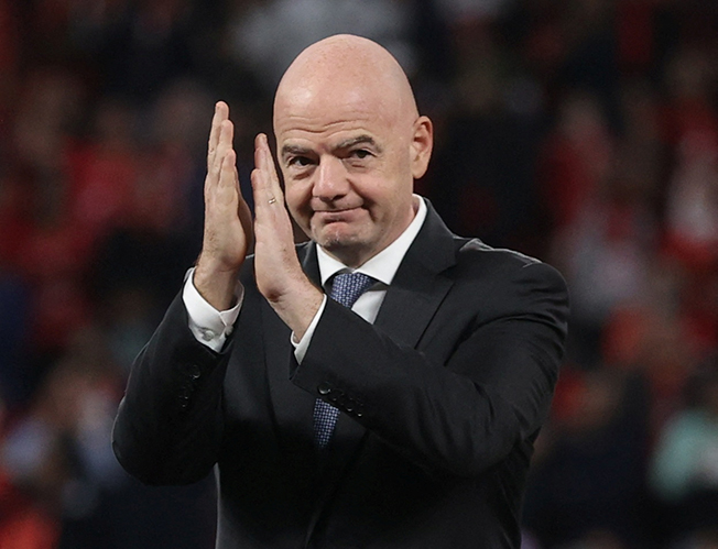 cover Infantino sparks anger saying biennial World Cup could prevent migrant deaths