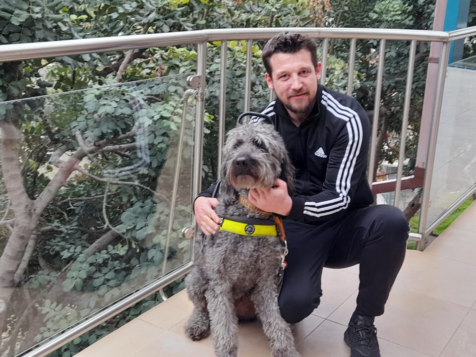 feature bejay main sander strijthagen with his guide dog olaf who was denied entry to a private nicosia hospital