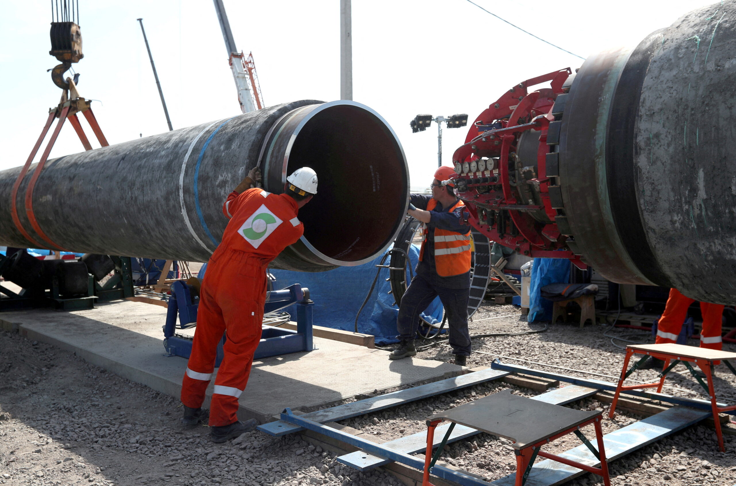 file photo: workers are seen at the construction site of the nord stream 2 gas pipeline in russia