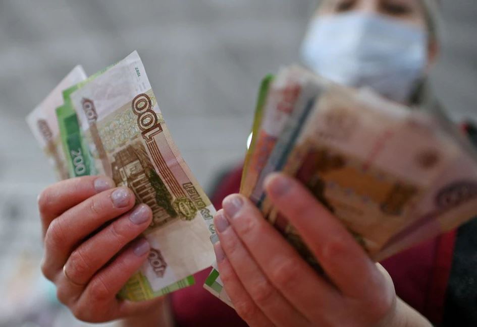 image Rouble steadies vs dollar in Moscow, hits record low outside Russia
