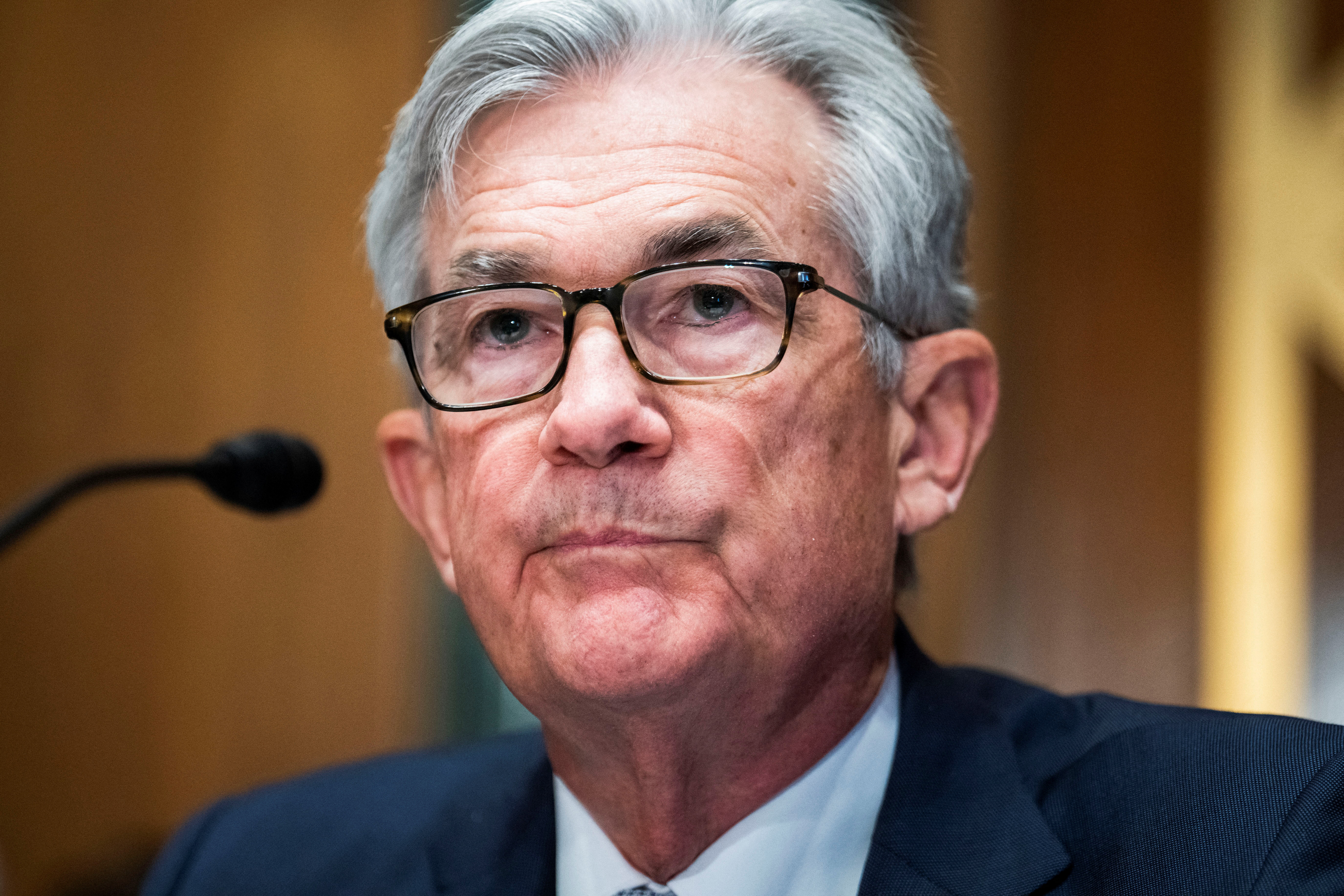 image Fed hikes rates, signals aggressive turn against inflation