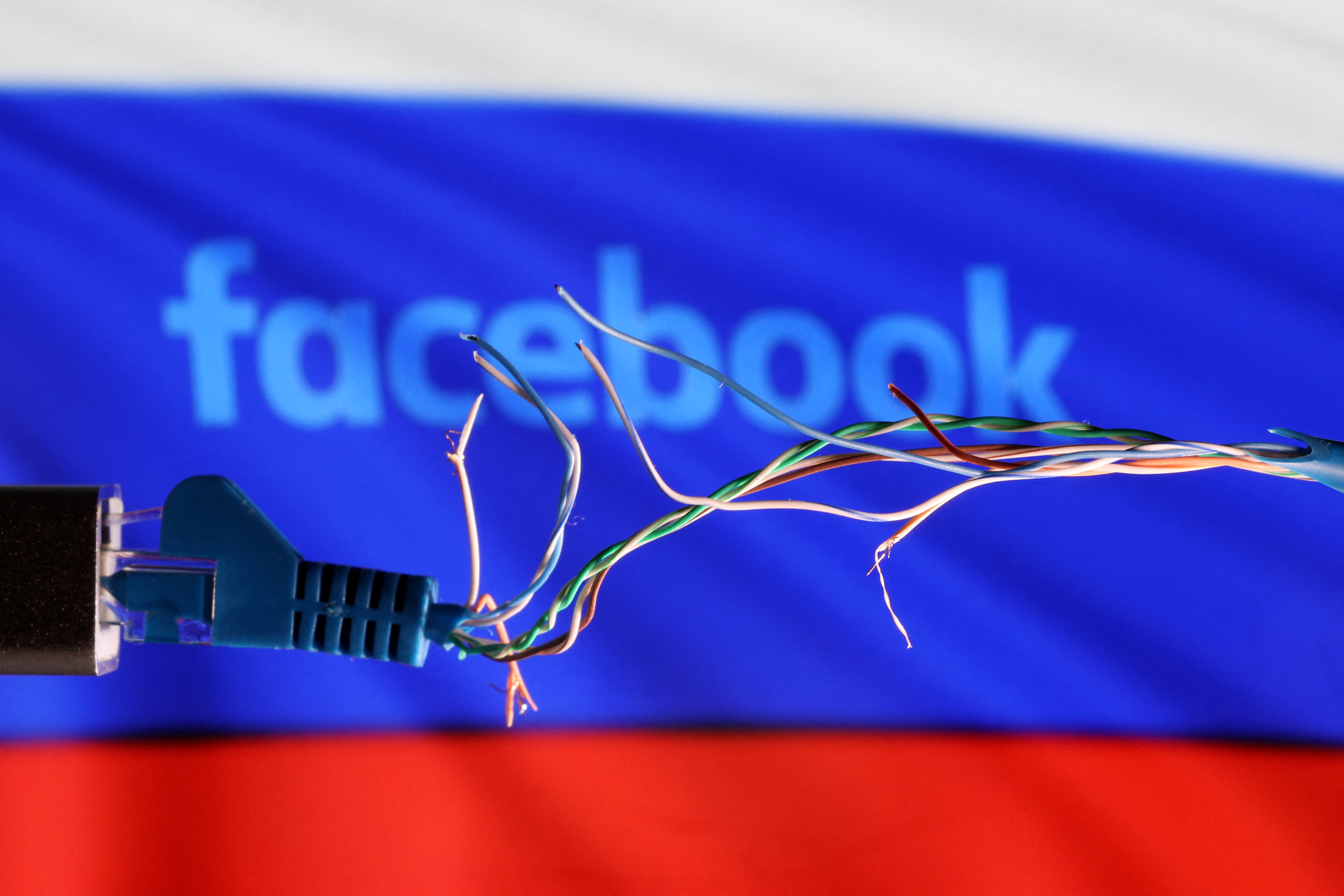 image Facebook owner defends policy on calls for violence that angered Russia