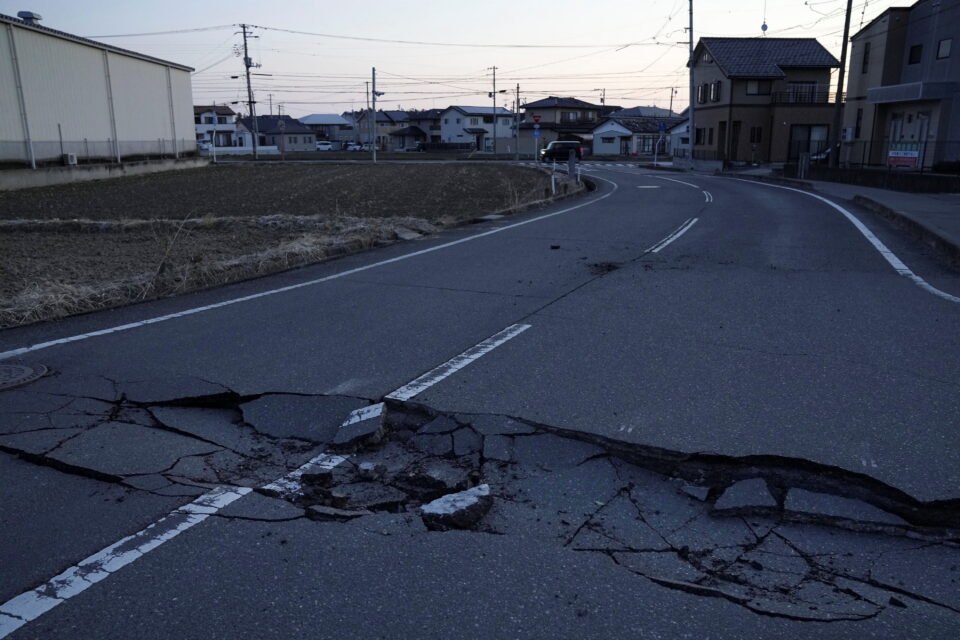 a broken road following a strong earthquake is pictured in soma