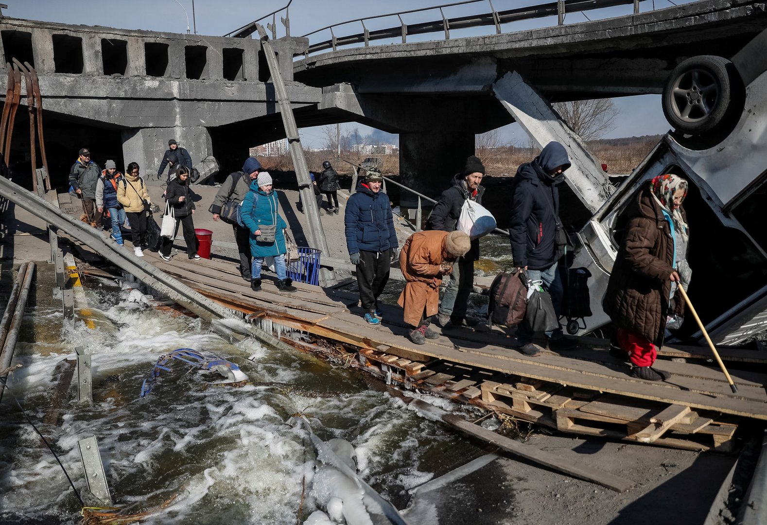 cover Ukraine says seven killed, including a child, after Russia fires at convoy
