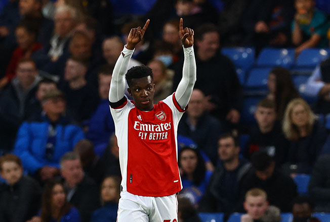 image Arsenal boost Champions League push with 4-2 win at Chelsea