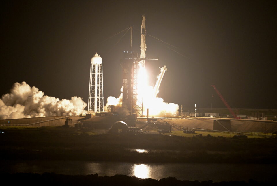 a spacex falcon 9 rocket lifts off carrying four astronauts on a six month expedition to the international space station, at cape canaveral