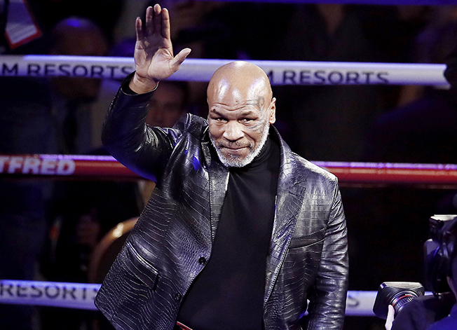 image Mike Tyson punches passenger on plane