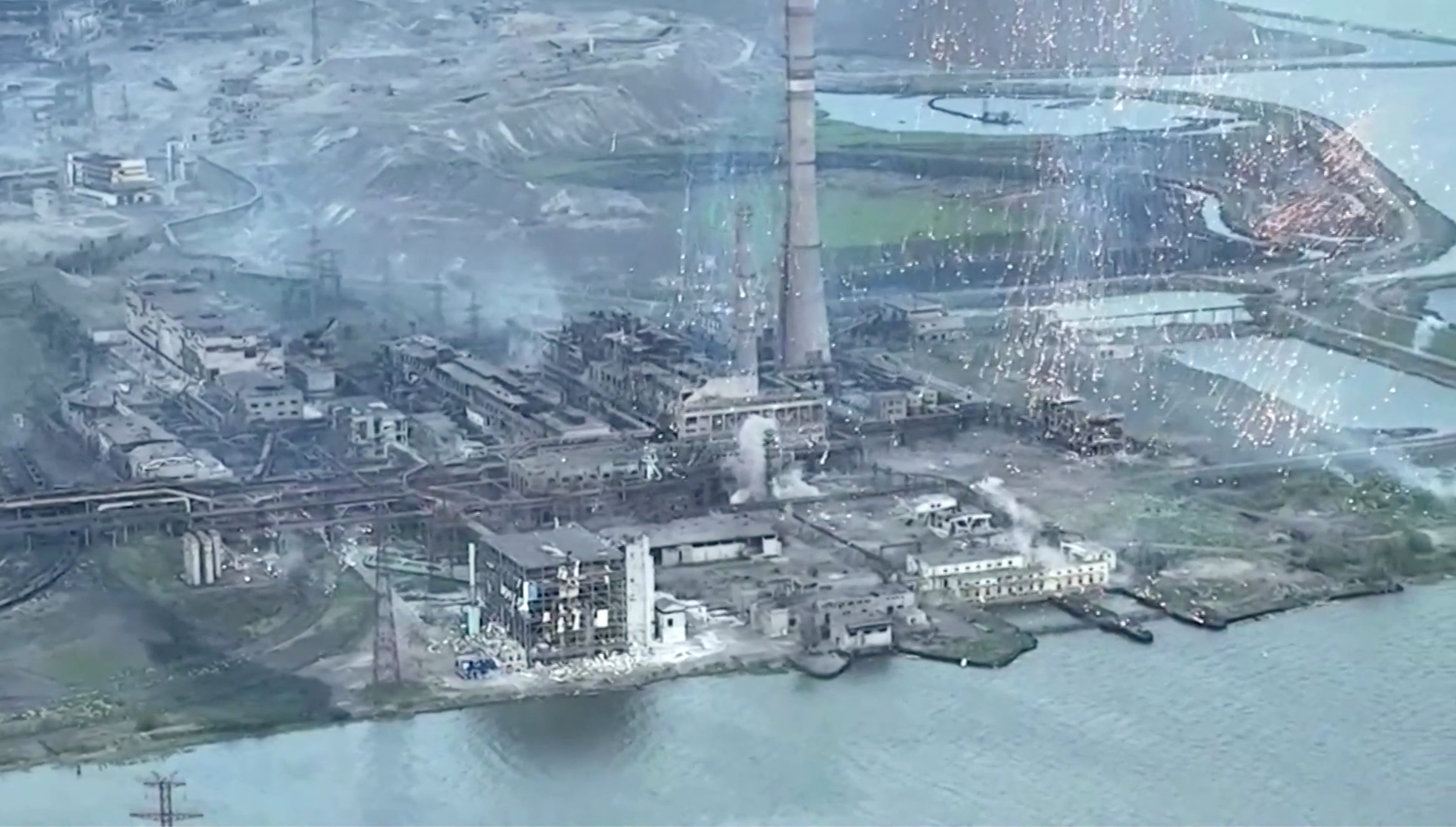 image Burning munitions cascade down on Ukrainian steel plant
