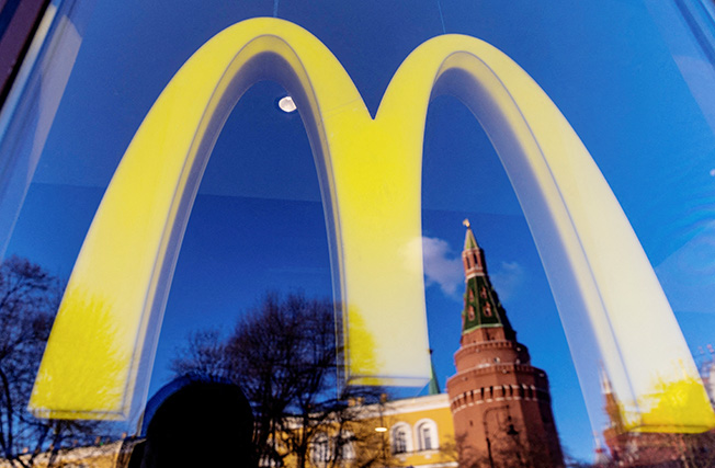 file photo: a logo of the mcdonald's restaurant is seen in the window in moscow