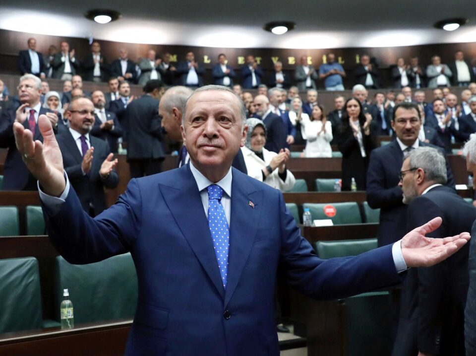 turkish president erdogan greets members of akp during a meeting at the parliament in ankara