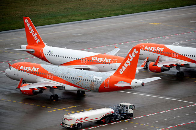 file photo: easyjet airplanes are parked on the tarmac during the official opening of the new berlin brandenburg airport (ber) "willy brandt", in schoenefeld near berlin