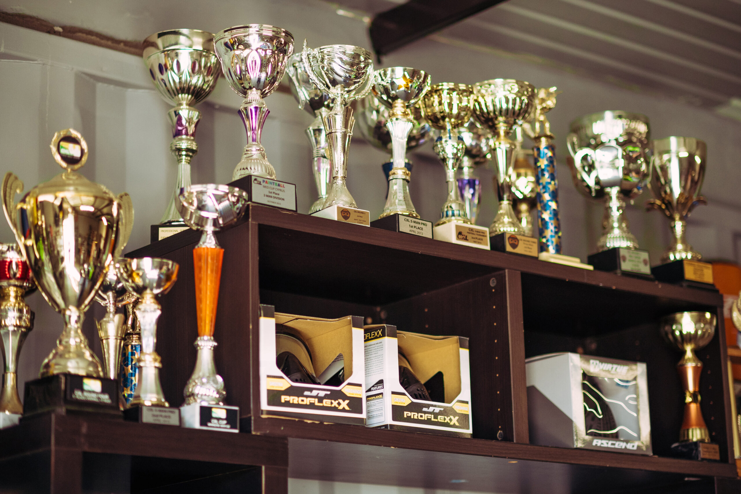 feature jon some of the many championship trophies won by cyprus paintball