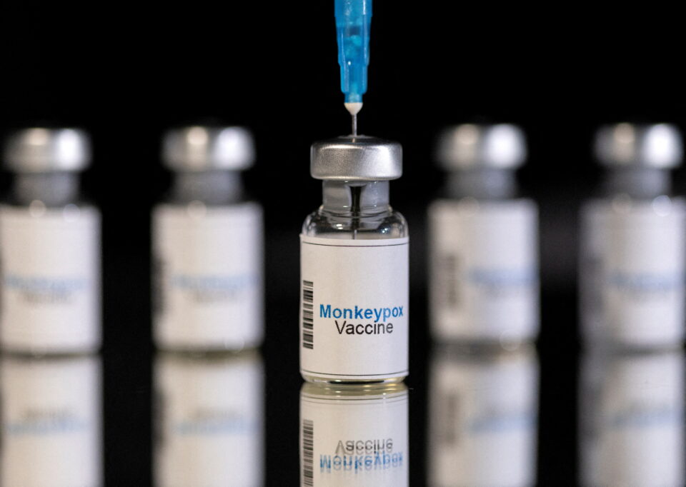 file photo: illustration shows mock up vials labeled "monkeypox vaccine" and medical syringe