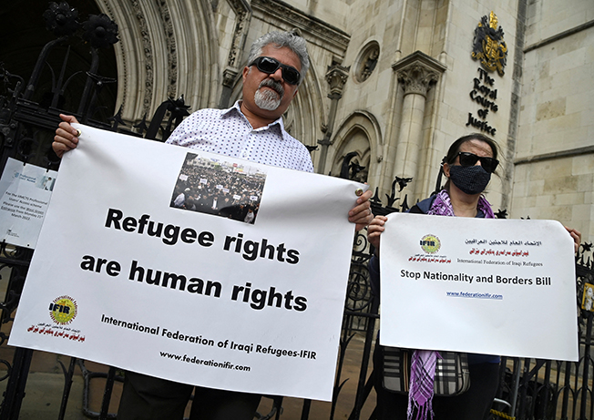 protest as legal case is heard over halting deportation of asylum seekers, at the royal courts of justice, london