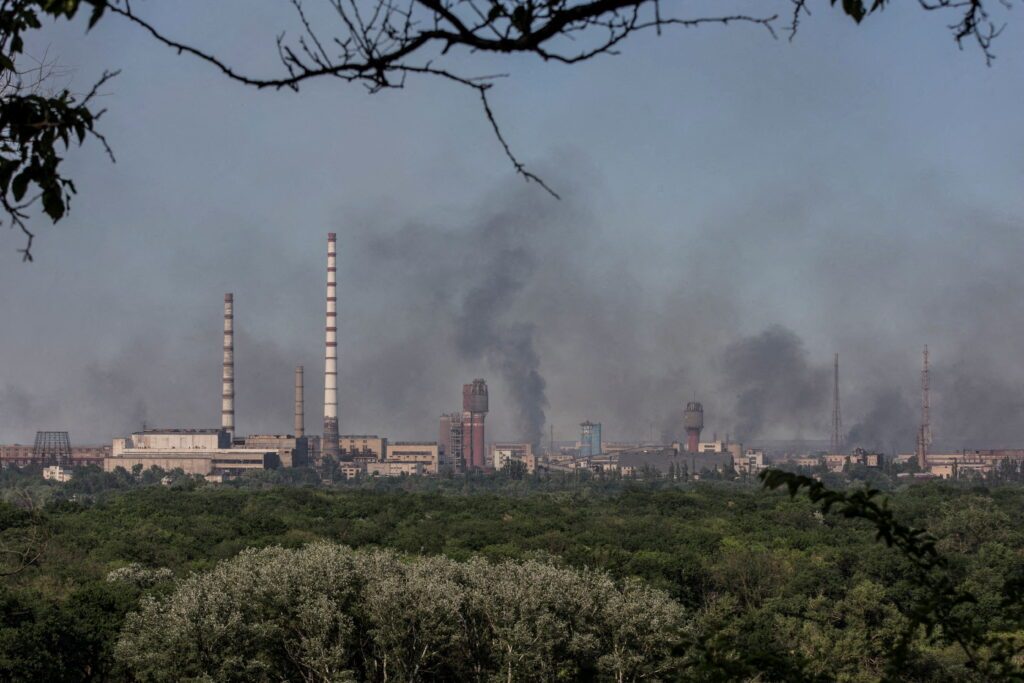 file photo: file photo: smoke rises after a military strike on a compound of sievierodonetsk's azot chemical plant
