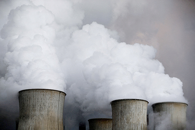 file photo: steam rises from the cooling towers of the coal power plant of rwe in niederaussem