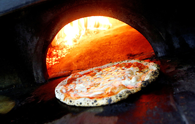 image Pizza wars: heated words in Italy over fair price of dish