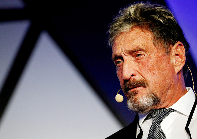 file photo: john mcafee, co founder of mcafee crypto team and ceo of luxcore and founder of mcafee antivirus, speaks at the malta blockchain summit in st julian's