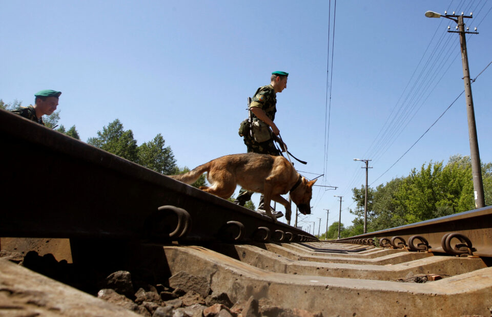 file photo: belarussian border guards cross the railways near the belarus poland border on the outskirts of the western city of brest
