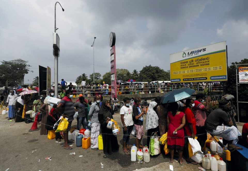 comment omiros people stand in a long queue to buy kerosene oil due to shortage of domestic gas as a result of country's economic crisis