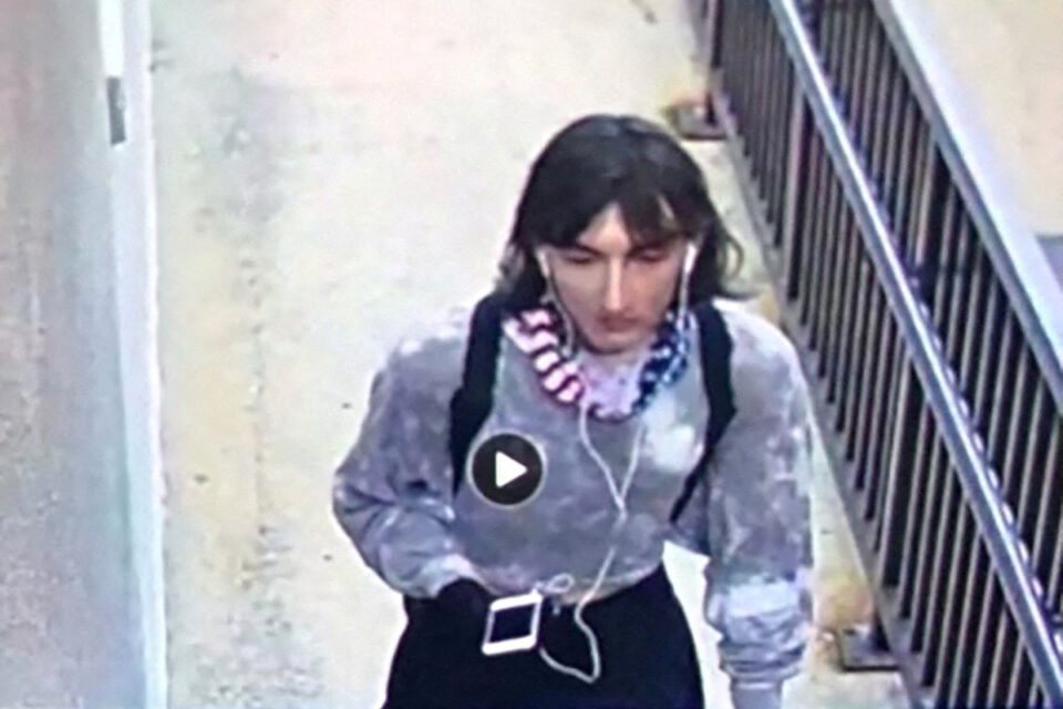surveillance image of what police believe to be is robert (bob) e. crimo iii dressed in women's clothing