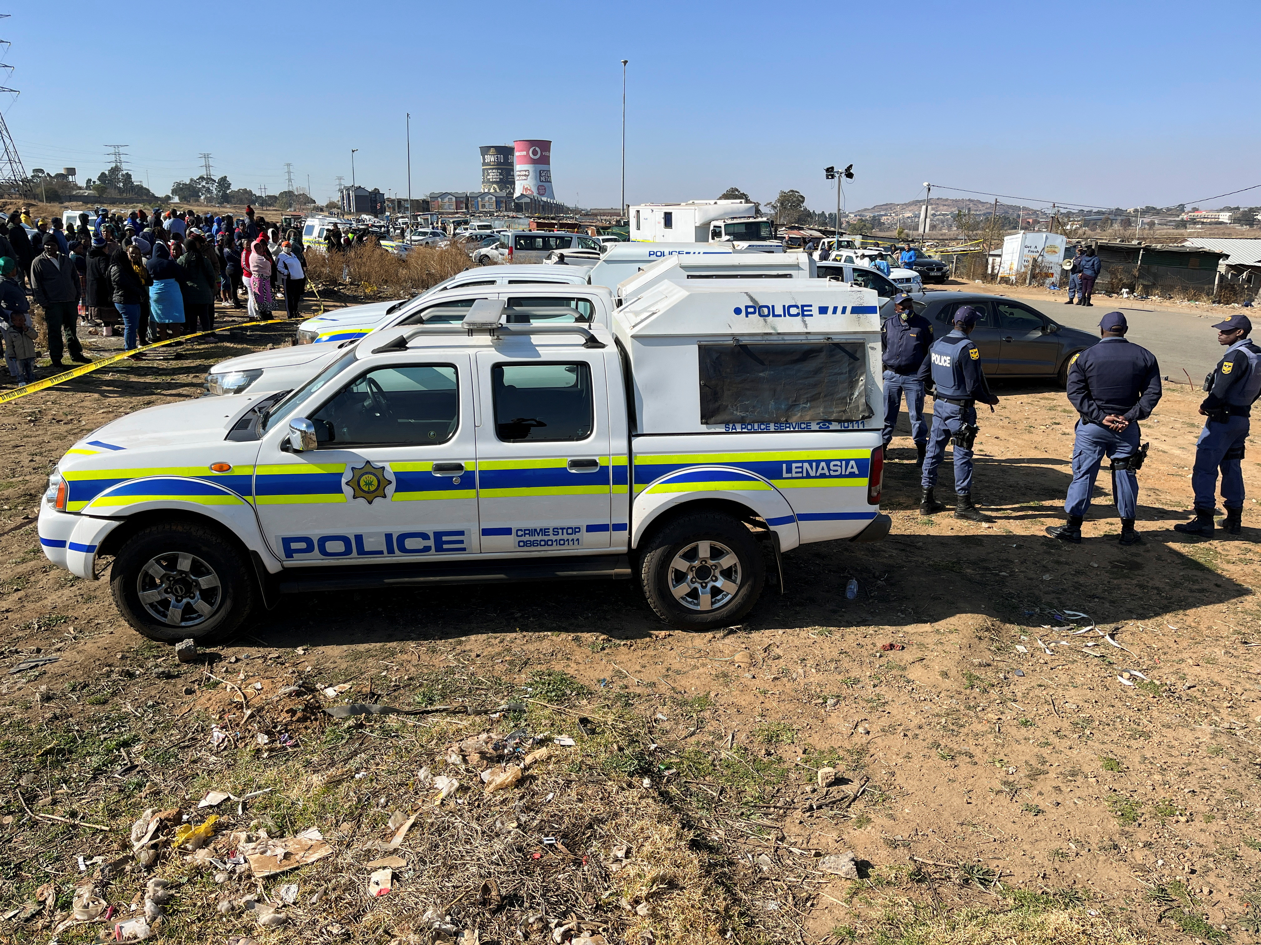 image Gunmen kill 19 people in &#8216;random&#8217; bar shootings in South Africa