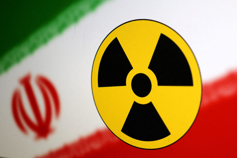 illustration shows nuclear symbol and iran flag