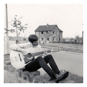 1966 in the uk playing guitar