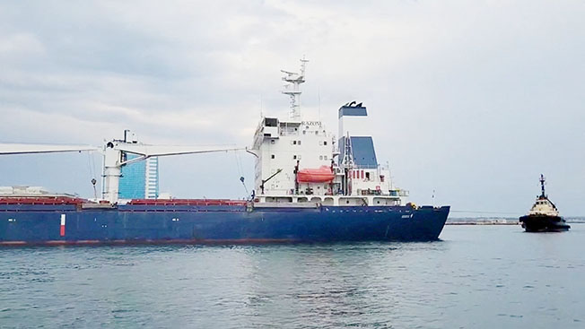 the sierra leone flagged cargo ship, razoni carrying ukrainian grain leaves the port, in odesa