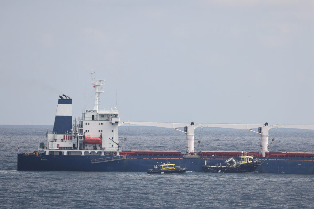 the joint coordination centre officials board sierra leone flagged cargo ship razoni, carrying ukrainian grain, for an inspection in the black sea off kilyos, near istanbul