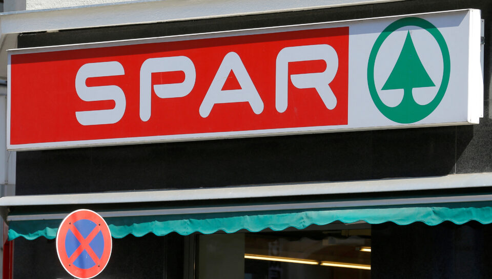 file photo: the logo of austrian supermarket chain spar is seen behind a traffic sign at a shop in vienna
