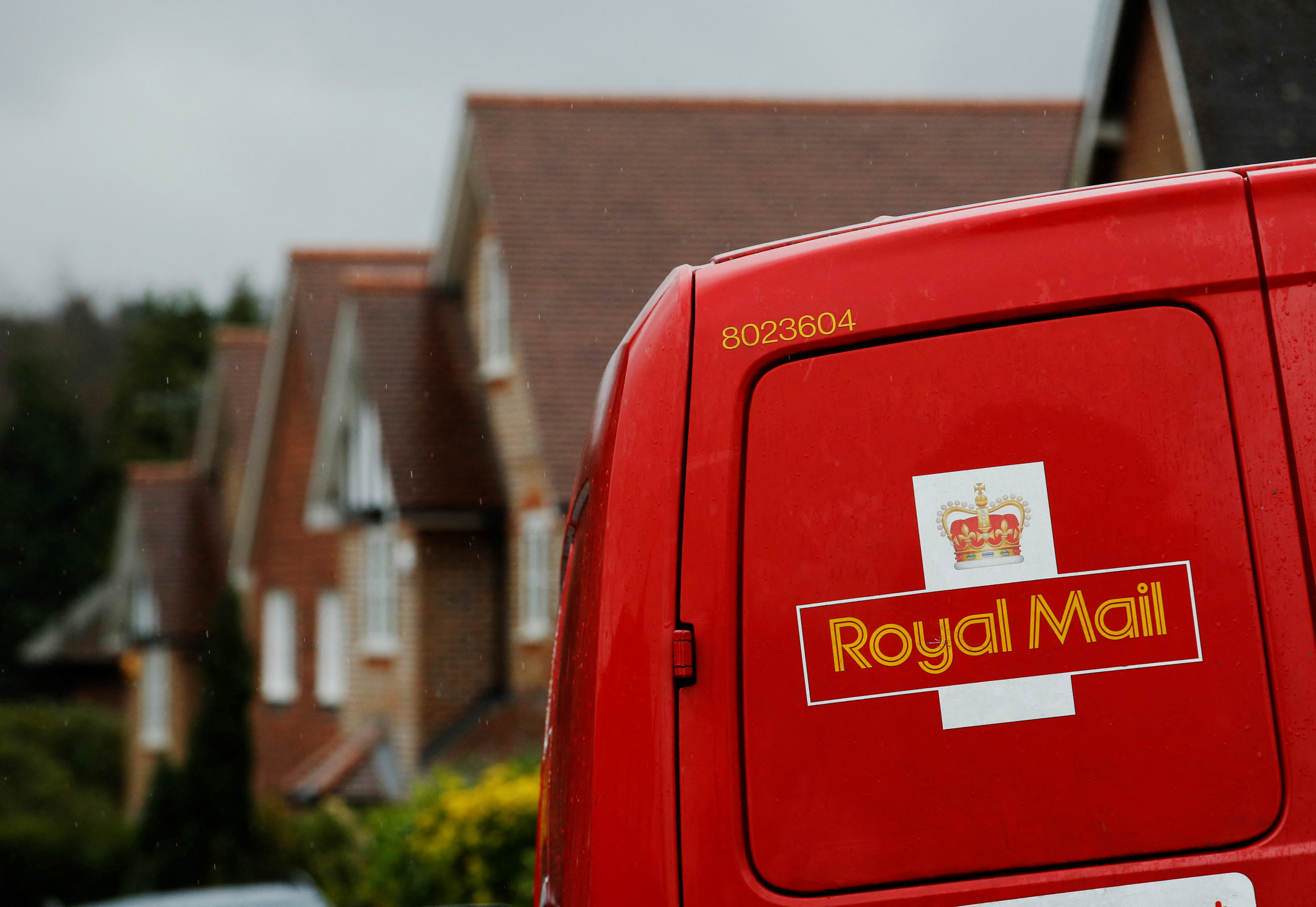 image Thousands of British postal workers walk out over pay