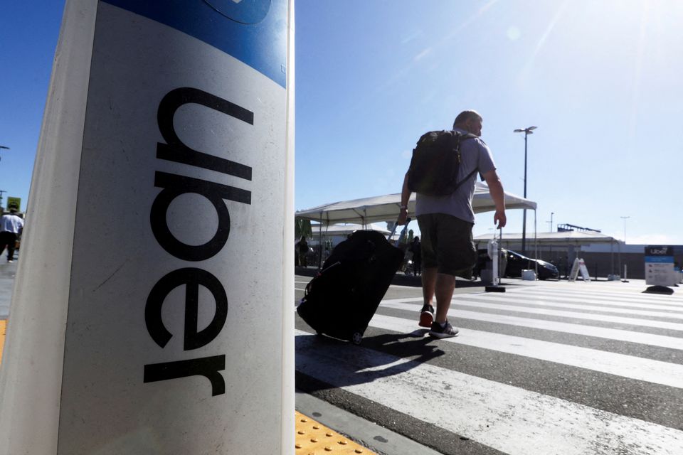 image Uber turns cash flow positive for the first time, shares surge