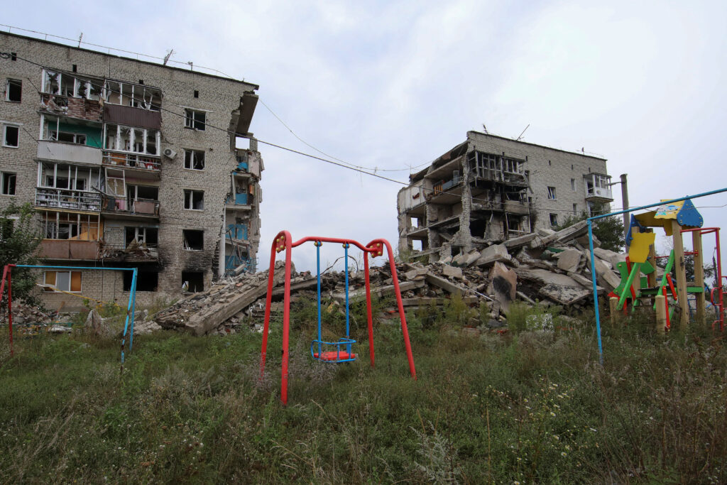 view shows a residential building destroyed by a military strike in the town of izium
