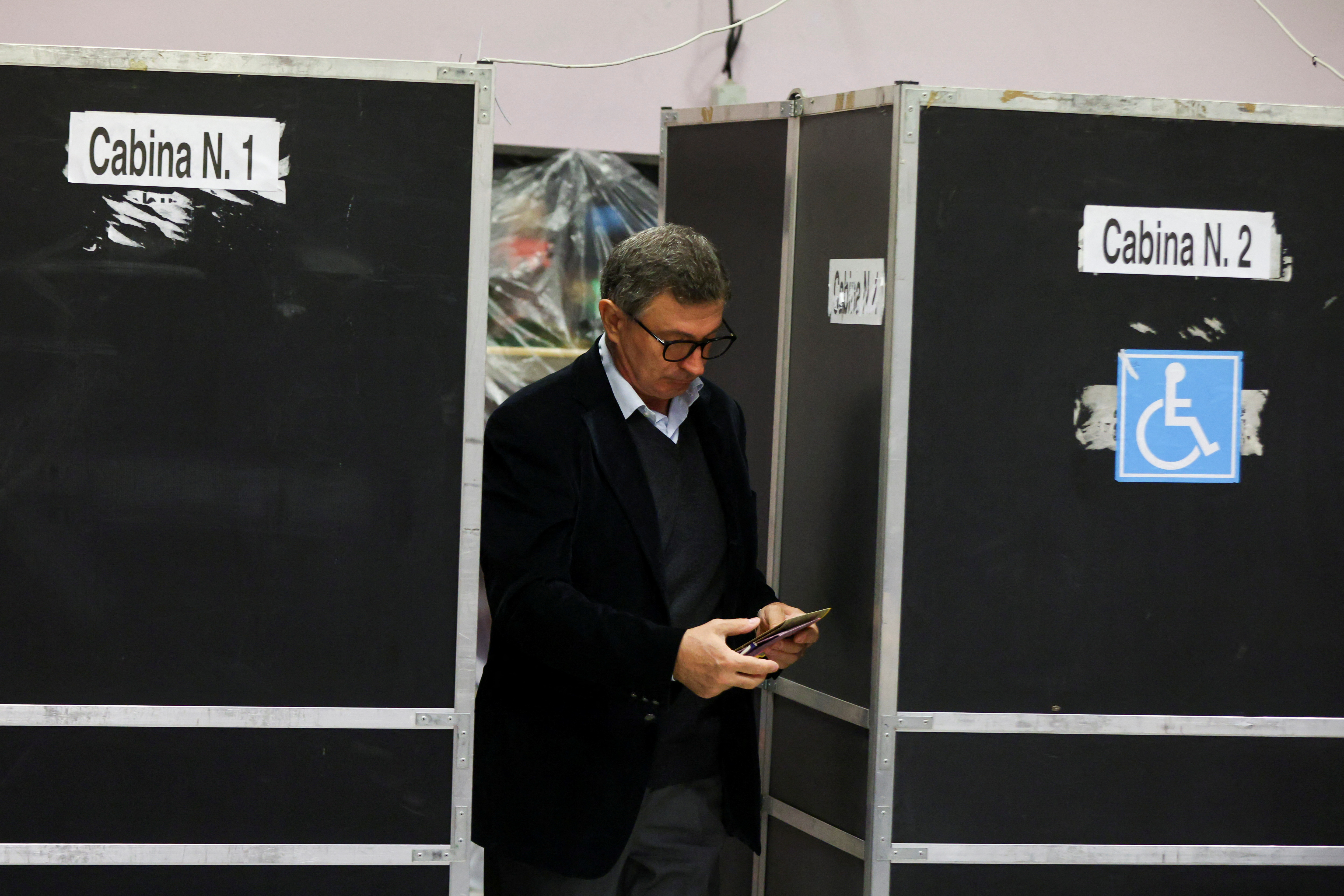 image Right-wing alliance seen as likely winner as Italians vote