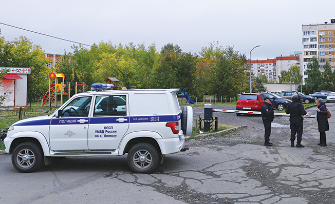 image Swastika-wearing gunman kills 13 at Russian school