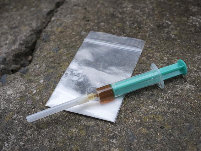 Man arrested three months after attack, heroin found in car