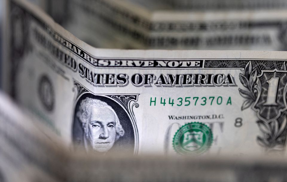 image Dollar towering, stocks cowering as Fed flags more hikes