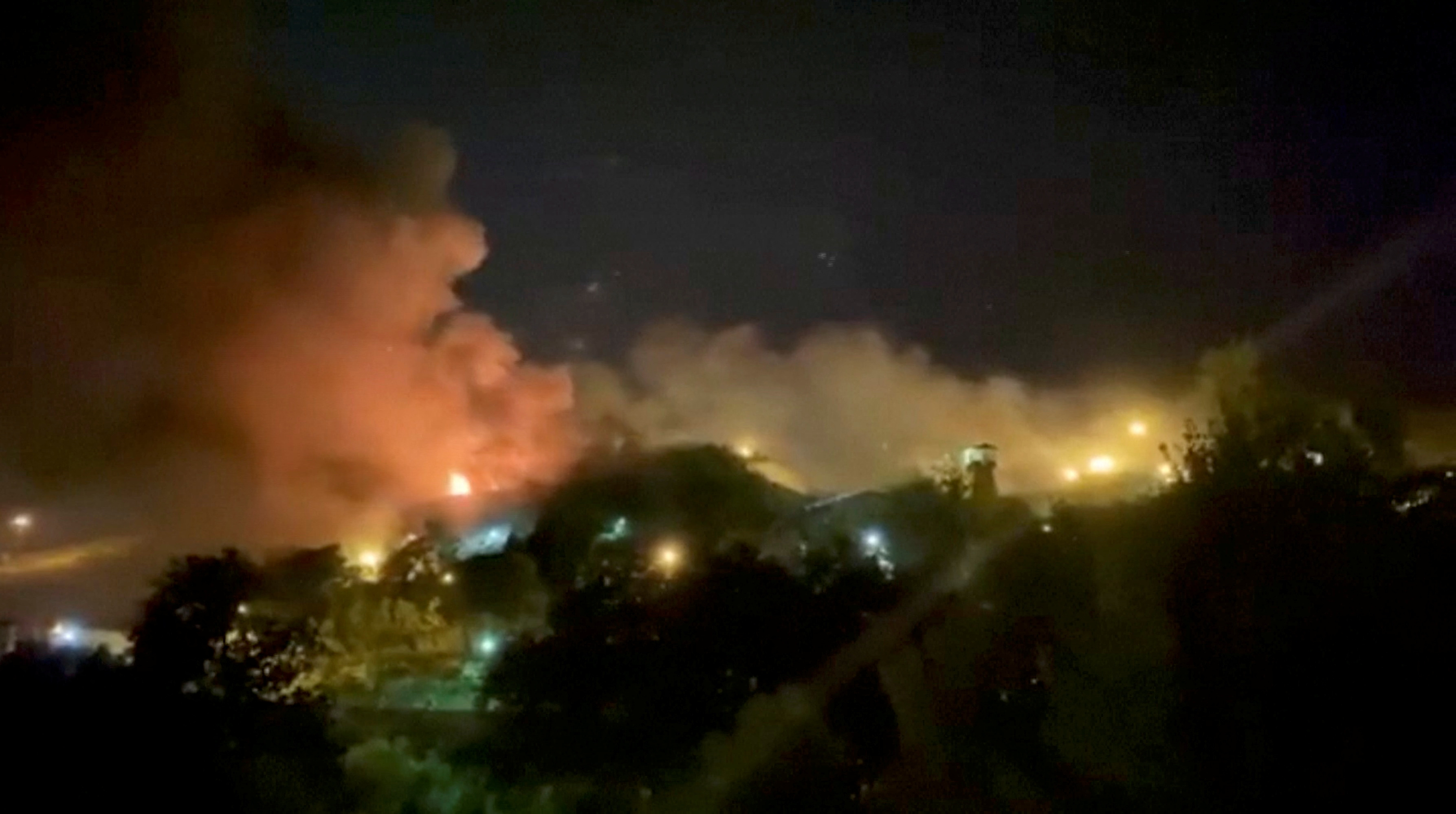 cover Iran prison fire kills four, injures 61 as protests persist (Update 2)