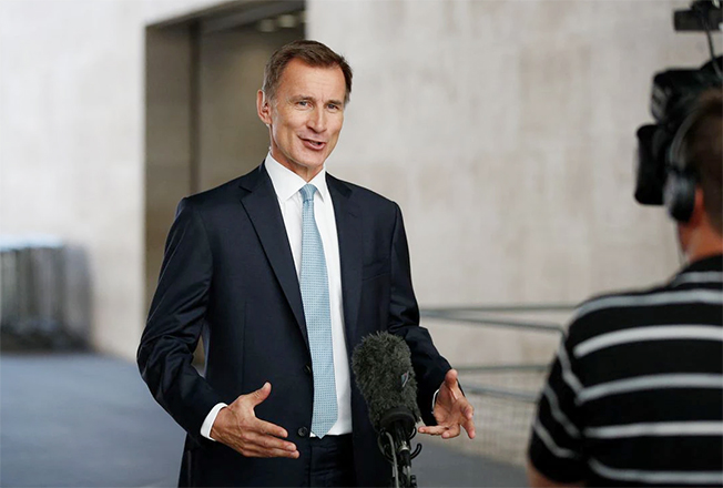 image UK finance minister Hunt vows to win back financial market trust