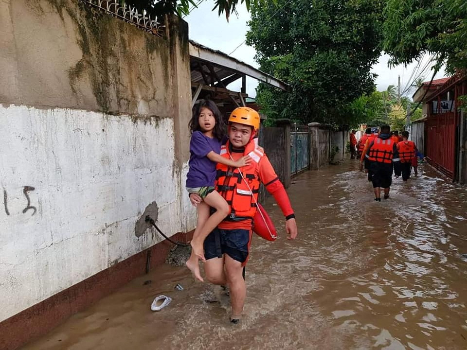 image Philippine capital braces for storm Nalgae, death toll cut to 45